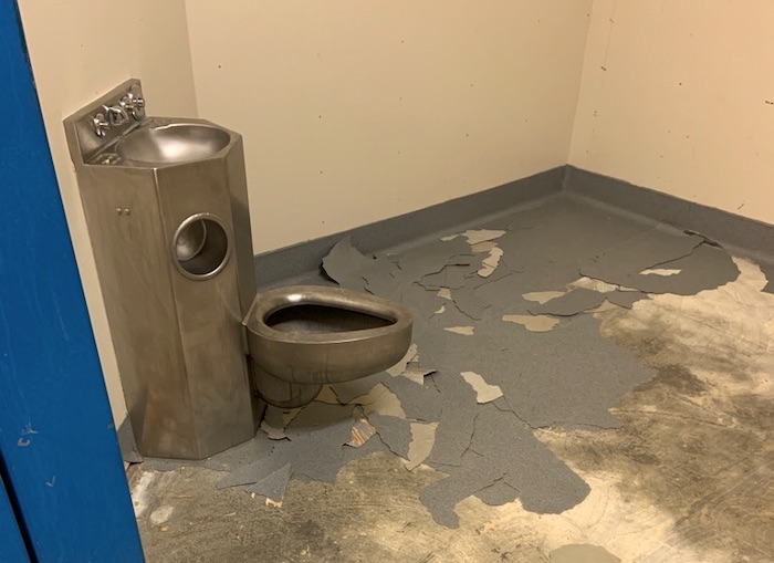 Damaged Prisoner Holding Cell
